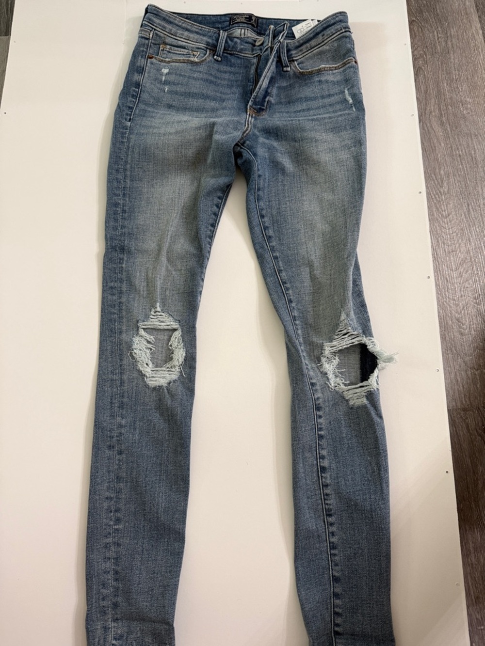 Women’s Distressed Mid-Rise Super Skinny Jeans